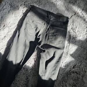 Black 721 High Rise Skinny by Levi's sz 28